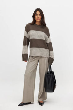 Round Neck Knitted Striped Sweater Trendy Striped Sweater With Ribbed Cuffs, Fall Sweater With Striped Hem And Long Sleeves, Striped Knit Sweater For Work, Striped Sweater With Ribbed Cuffs For Work, Oversized Striped Sweater For Fall, Cozy Striped Ribbed Sweater, Striped Sweater For Winter Workwear, Striped Sweater For Workwear In Fall, Striped Sweater For Work In Fall