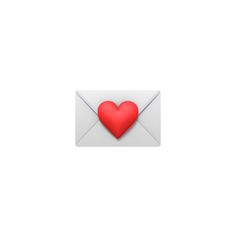 an envelope with a red heart in it