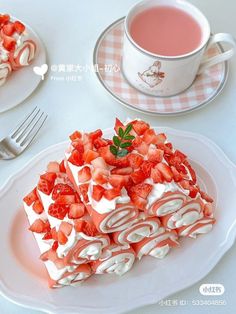 a piece of cake on a plate with strawberries