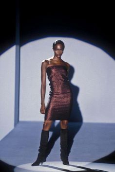 For Sale on 1stDibs - Presenting a mid-length dark copper metallic tube dress designed by Tom Ford for Gucci. This dress debuted on none other than Naomi Campbell as the finale Gucci Fitted Mini Dress For Night Out, Gucci Summer Dress For Night Out, Gucci Knee-length Cocktail Dress, Elegant Sleeveless Gucci Mini Dress, Gucci Fitted Dress For Night Out, Fitted Gucci Dress For Night Out, Sleeveless Gucci Cocktail Dress, Gucci Summer Party Dress, Chic Gucci Dress For Night Out