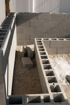 cinder blocks laid out in the shape of a fire hydrant