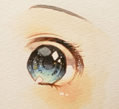 an eye is shown with watercolor and pencils on the paper, which shows it's reflection