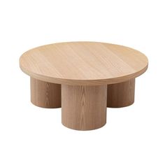 two round wooden tables sitting on top of each other