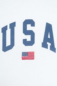 an american flag is on the back of a white t - shirt that says usa