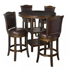 a round dining table with four chairs and two barstools on the top shelf