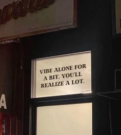 a sign on the side of a building that says vibe alone for a bit, you'll realize a lot