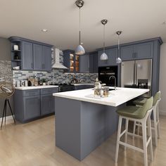 a large kitchen with blue cabinets and white counter tops, an island in the middle