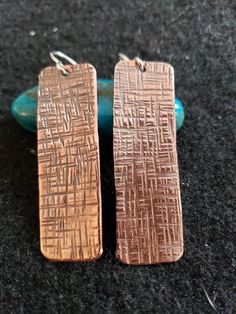 These handmade earrings have been hammered with a Cross-Hatch pattern. 1.5 inches long by .5 inches will make a great gift for the cowgirl. Patinaed for antiquity. Hammered Metal Jewelry, Hammered Copper Earrings, Hatch Pattern, Hammered Metal, Hammered Copper, Copper Earrings, Copper Jewelry, Metal Stamping, Metal Jewelry