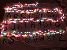 the letters and numbers are decorated with lights