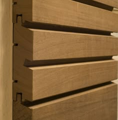 a close up view of some wooden drawers