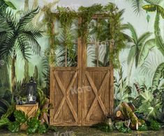 an image of a wooden door surrounded by greenery and palm trees on the wall