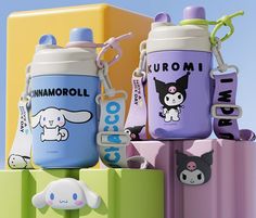 two water bottles on top of each other with an animal keychain attached to them