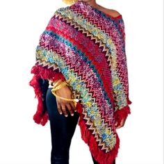 Multi Color Fringe Hem Knit Poncho, Fall Weather Ready, Stay Warm In This Multicolor Tribal Print Poncho Shrug Sweater. One Size Fits Most. Red Bohemian Knit Sweater, Red Knitted One Size Sweater, One Size Red Knitted Sweater, Red Long Sleeve Poncho, One Size, Red Bohemian Poncho For Winter, Red Bohemian Sweater For Winter, Bohemian Red Winter Sweater, Red Bohemian Winter Sweater, Knit Poncho