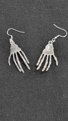 Gothic skeleton hands earrings, made from sliver plated earring hooks Skeleton Hand Earrings, Metal Skeleton Hand Bracelet, Hands Earrings, Skeleton Hand Ring, Fish Skeleton Earrings, Skull-shaped Metal Earrings, Gothic Skeleton, Hand Earrings, Skeleton Hand