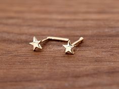 Minimalist 3.5mm Tiny Petite Flat Star 14 Karat Yellow Gold L Bend Ball End 23 Gauge Nose Stud Ring Piercing Jewelry ▷14K Solid Gold ▷14K Stamped ▷Prong Set ▷Thickness: 23 Gauge | 0.6mm ▷Post Length: L 7 mm & 6mm | Ball 7mm ▷Style: L Shape, Ball ▷Gift Box Black Hills Gold Rings, Black Hills Gold, Nose Stud, Nose Ring Stud, Personalized Rings, Ring Collections, Piercing Jewelry, Prong Setting, Body Jewelry