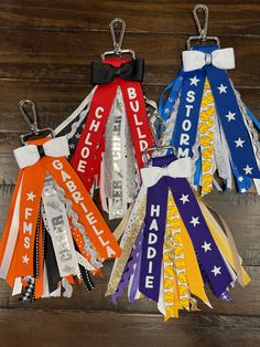 These zipper pulls are a great addition to any sports bag or carry all bag for you moms out there that take care of it all! Cheer/dance camps are just around the corner and would be a special little sis/big sis gift! These are roughly 6.5" long with at least 15 strands of ribbon that when doubled is 30 hanging ribbons! They are stitched across the top to not allow any ribbon slipping from all handling. Ribbons of various sizes, shapes and color will be used to create the tassle. They are made on Cheer Ribbon, Bag Tassels, Homecoming Spirit Week, Homecoming Spirit, Cheer Bag, Dance Camp, Team Bonding, Sports Bags, Dance Gifts