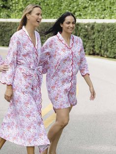 Getting dressed for bed is a stylish affair when you wear our pink floral nightshirt. Designed by Heidi and crafted in a custom floral pattern of pink watercolor botanicals, the nightshirt features three-quarter sleeves finished with a scalloped hem. Lightweight cotton offers the perfect level of warmth and comfort morning and night. ﻿This style is running small, please size up if needed Product Details Breathable, lightweight, and soft A slight A-line hem is a perfect length Painterly flower petals in pink are layered over a blue floral pattern for a chic contrast Red scalloped detail on the collar and cuffs adds a refined and finished touch 3/4-sleeve length Spacious side pockets to hold your phone and other necessities Button closures lay flat and keep the nightshirt closed 100% Cotton