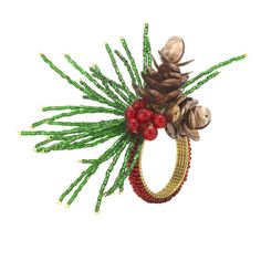 a pine cone with berries and other decorations