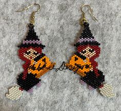 the beaded earrings have been made to look like an image of a cartoon character