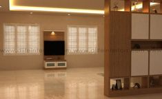 an empty living room with white cabinets and beige walls