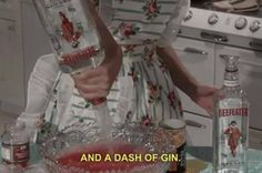 a woman is pouring something into a glass bowl with the words and a dash of gin on it