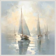 two sailboats in the water on a foggy day with sun shining through the clouds