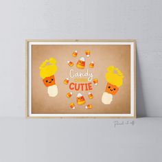 an art print with candy and candies in the shape of carrots on a brown background