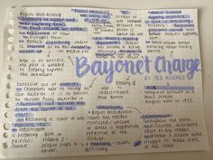 a close up of a notebook with writing on it and the words bayonet charge written in blue ink