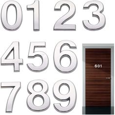 the numbers are cut out and placed next to each other on a white background with wood door