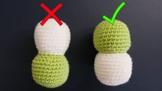 two crocheted snowmen with green and white tops, one has red x on it