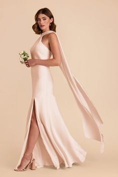 A halter neck gown with a dramatic yet elegant train. Available in Champagne. Shop Birdy Grey! This halter neck gown, with a dramatic train, is as equally elegant as it is show-stopping. | Champagne Bridesmaid Dress Matte Satin Size Small | Birdy Grey Eileen Champagne Bridesmaid Dress, Halter Neck Gown, Taupe Bridesmaid Dresses, Champagne Bridesmaid Dresses, Champagne Bridesmaid, Birdy Grey, Matte Satin, Satin Dress, Birdy