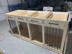 two wooden cabinets with metal bars on them