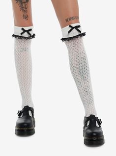 Spice up your look with these white  crochet over-the-knee socks! The come with cuff detailing at the top and dainty  black satin bow accents.NylonHand wash cold; drip dryImported White Knee-high Stockings For Spring, White Knee-high Stockings For Fall, White Stockings For Fall, Gyaru Socks, Over The Knee Socks Outfit, Garter Socks, Y2k Socks, Lace Trim Socks, Lacy Socks