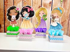 "Princess Ariel Belle Jasmine Snow White Cinderella Sleeping Beauty birthday handcrafted wood centerpieces birthday Princess Party INDIVIDUAL These centerpieces are FULLY ASSEMBLED, DECORATED, and ready to be displayed! They are completely handcrafted and made with attention to detail. Matching ribbon is attached around the base, and decorated with tissue paper! This listing is to purchase centerpieces individually! You may purchase In ANY amount! Choose from the following.... Moana, Rapunzel, S Princess Party Centerpieces, Royal Princess Party, Cinderella Centerpiece, Sleeping Beauty Birthday, Moana Princess, Cinderella Sleeping, Centerpieces Birthday, Princess Centerpieces, Princess Birthday Party Decorations