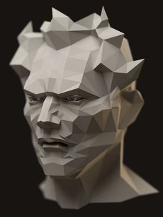 the head of a man made out of polygonal shapes, with his eyes closed