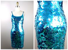 "This is a show-stopping dress! It's fully embellished with reflective bright blue paillette sequins and in perfect condition! ABSOLUTELY AMAZING!! Measurements: (notes, there is a bit of stretch in the material) Bust - 32/34\" Waist - 26/28\" Hips - 34/36\" Length - 35\" All of my items come from a smoke-free and pet-free home. If you would like more info or have any questions, please don't hesitate to ask!" Business Suits, Sequined Dress, Business Suit, Embellished Dress, Dress Clothes For Women, Bright Blue, Sequin Dress, Party Dress, Cocktail Dress