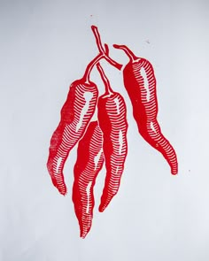 red peppers are hanging from a branch on a white background with black and red lines