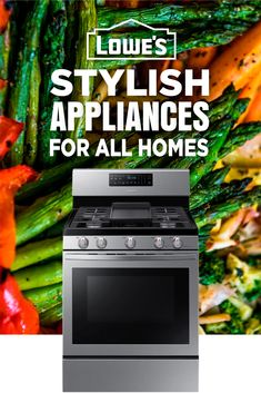 a stove top oven sitting in front of a pile of assorted veggies