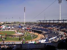 a baseball stadium filled with lots of people