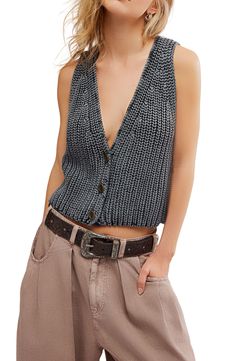 Love to layer in this chunky sweater-vest knit in a cropped silhouette with a low-dipping neckline. 16" length (size Medium) Front button closure V-neck 100% cotton Hand wash, dry flat Imported Free People Vest, Cropped Sweater Vest, Oversized Cropped Sweater, Ceremonial Clothing, Gilet Crochet, Close To Me, Vest For Women, Outerwear Vest, Chunky Sweater