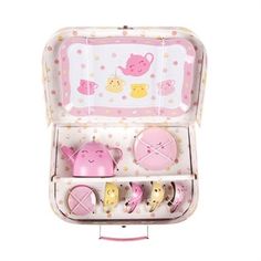 a pink and white box filled with lots of little pigs in it's compartments