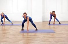 a group of people doing yoga poses on mats