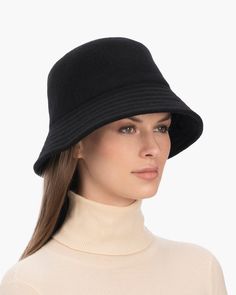 A cozy, lightweight women's bucket hat of spun wool with trapunto stitched brim rolls up easily into a coat pocket or a tote bag. Eric says, "It's definitely a bucket hat season where the attitude is a bit more casual than a fedora." What makes this women's bucket hat most desirable is that the crown is spun and then blocked to achieve the shape; The crown has no visible seams so it doesn't feel thick, while providing great insulation and protection from the elements. Brim span: 2.75"(7cm) Fully Gold Sand, Coat Pocket, Navy Linen, Natural Gold, Hats For Sale, Fedora Hat, The Crown, Black Cream, Cream White