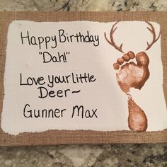 a birthday card with a handprinted deer's foot and text that reads, happy birthday dahli love your little deer - gummer max