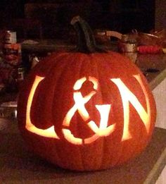 a carved pumpkin sitting on top of a counter