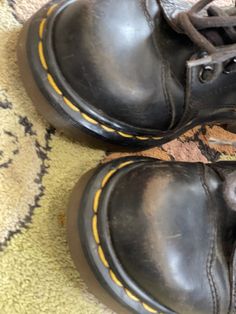 "Awesome kids vintage Dr. Marten Half Boots-Childrens Size 13 Docs-Black with black laces and classic yellow stitching on air wear soles. In very good condition with some scuffing on toes. See pics. Priced as is. Childrens Size 13 Measurements Length 7.5\" Ball width 2.5\" Heel width 2\" Please message me with questions before purchasing. All sales are final and ship fast from the Vermont shop. Find us on Instagram @anasclosetfullofcolor" Grunge Lace-up Boots With Round Toe, Vintage Black Combat Boots With Round Toe, Vintage Black Combat Boots For Winter, Vintage Black Winter Boots, Vintage Black Lace-up Boots For Winter, Vintage Black Lace-up Winter Boots, Vintage Black Lace-up Boots For Fall, Vintage Steel Toe Lace-up Combat Boots, Vintage Black High-top Lace-up Boots