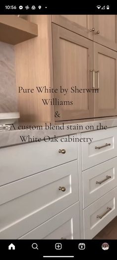 a kitchen with white cabinets and wood flooring on the counter top is featured in this video