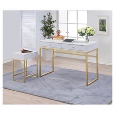 two white desks with gold legs in front of a window and rug on the floor