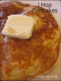 a stack of pancakes with butter and syrup on top that has the words hop pancakes written above it