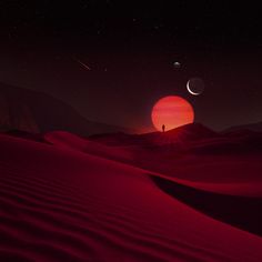 the sun is setting in the desert with two planets